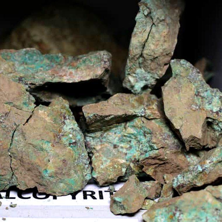 Green-stained copper ore specimen with chalcopyrite