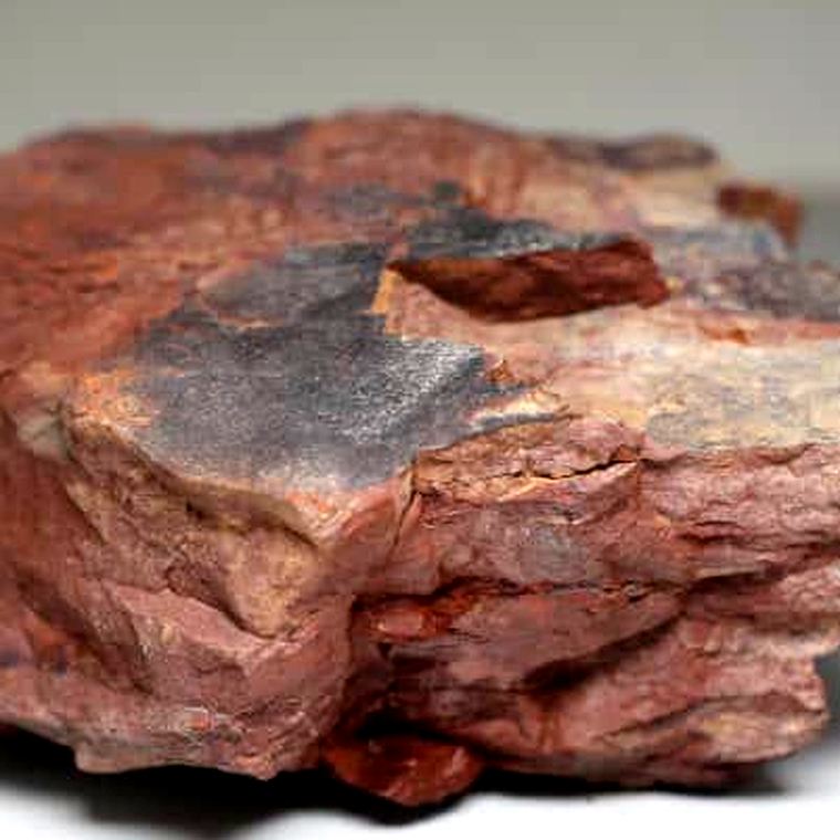 Reddish thorium ore specimen